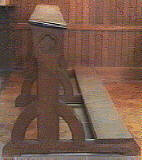 carved wooden prayer bench