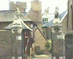 photograph looking through the front gates